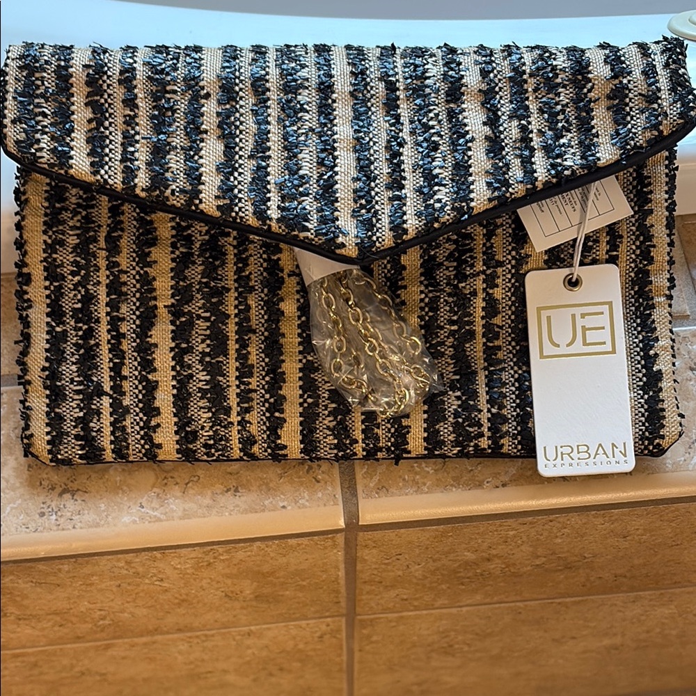 NWT!!Urban Expressions Black and Cream Textured Clutch with strap for crossbody